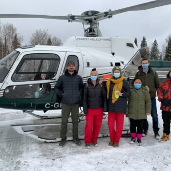 people and helicopter