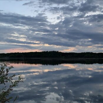 Clouds, trees and water
