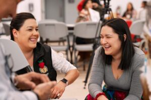 two women laughing